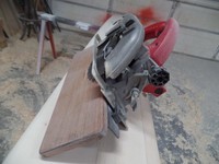 Tapering sled for cutting planks and masts